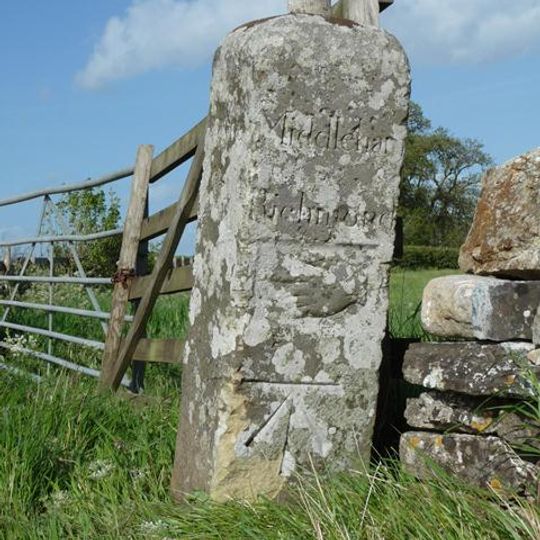 Guidestone, at X rds with UC road nr Stoop House Farm