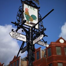 The Cock sign on Sutton High Street