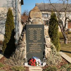 Monument to the fallen in the gallery on the village square