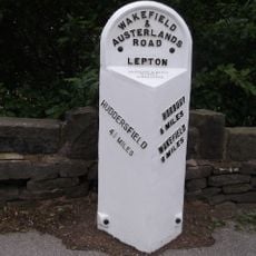 3.25 Miles Post In Front Of Football Ground