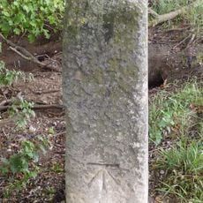 Milestone, Beeston, by slip road onto A428