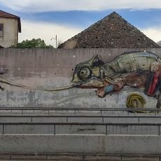 Escultura Mural - camaleão a apanhar a mosca