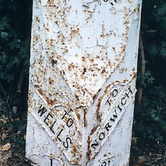 Milepost, opp. Caravan Club site entrance