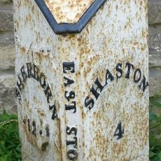 Milepost, half mile E of East Stour; opp.  house called Northwood.