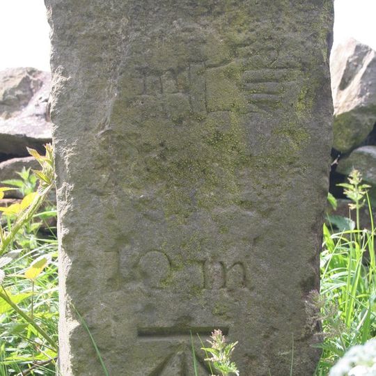 Milestone, NE of Otley. Pill White Lane