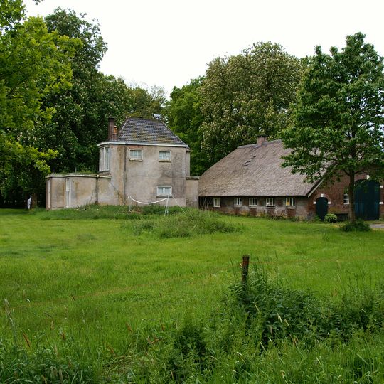 Boerderij onder rieten wolfdak