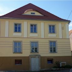 Fassade nördliche Giebelseite und Fassade westliche Traufseite als Reste eines ehemaligen Wohnhauses in geschlossener Bebauung Schloßstraße 11