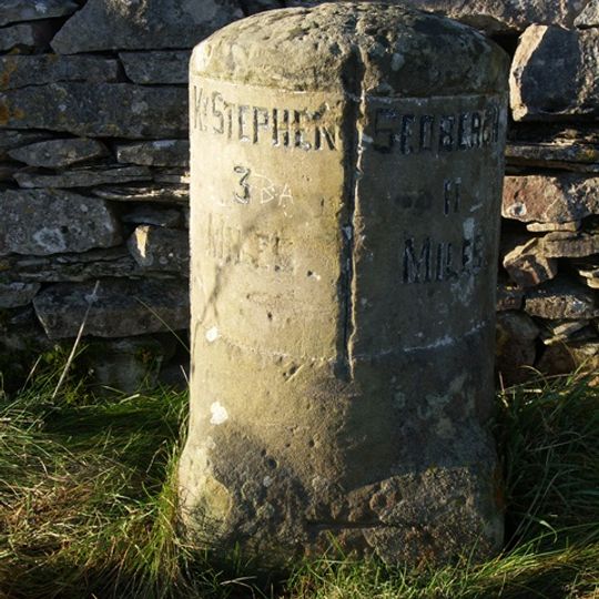 Milestone, Wharton Fell, a mile S of jct with A685
