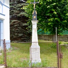 Wayside cross by chapel in Tojice