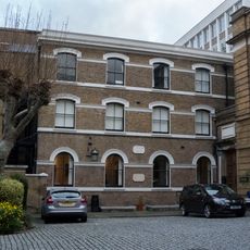 Benson Building, Abutting Wesley's Chapel