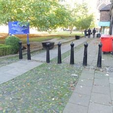 7 bollards at south west corner of churchyard, Nantwich