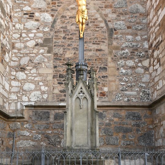 Crucifix in front of north facade of the Cathedral of Saints Peter and Paul in Brno