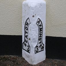 Milestone, Axminster Road, by Mountfield Lodge, on the old section of road through the village